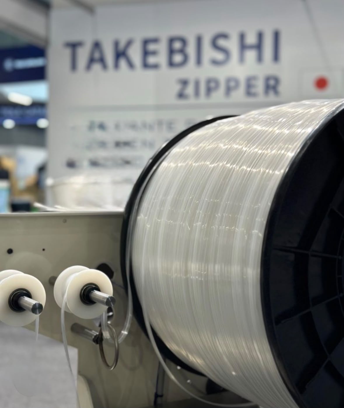 Takebishi zipper tape spool on manufacturing line